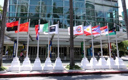 <p><strong>FIBA WORLD CUP 2023</strong>. The flags of the participating countries of the 2023 FIBA Basketball World Cup have been raised in front of the Smart Coliseum, Araneta City, Cubao, Quezon City on Aug. 17, 2023. The games will be held at the Philippine Arena in Bulacan, Smart Araneta Coliseum in Quezon City, and MOA Arena in Pasay City from Aug. 25 to Sept. 10, 2023. <em>(PNA photo by Robert Alfiler) </em></p>