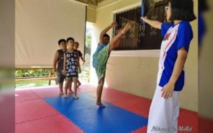 Ilocos Norte jin entices young neighbors into taekwondo