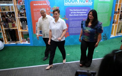 <p><strong>BOOK FEST.</strong> Vice President and Education Secretary Sara Z. Duterte (center) is the guest of honor during the Philippine Book Festival on Friday (Aug. 18, 2023) at SMX Convention Center in Davao City. The Philippine Book Festival is the largest traveling book festival in the country that puts a spotlight on Filipino books.<em> (PNA photo by Robinson Niñal Jr.)</em></p>