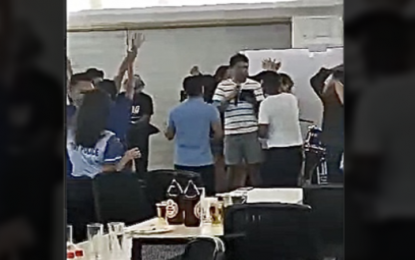 <p><strong>OFFICE PARTY.</strong> Workers and officials of the Philippine Ports Authority (PPA) Port Management Office Bohol (PMO Bohol) are caught on surveillance camera having a party at the port's multi-purpose hall on August 16. PPA General Manager Jay Santiago on Friday (August 18, 2023) sacked nine officials for their hand in the party, as he emphasized that a government office is not the place for drinking. <em>(Photo courtesy of PPA)</em></p>