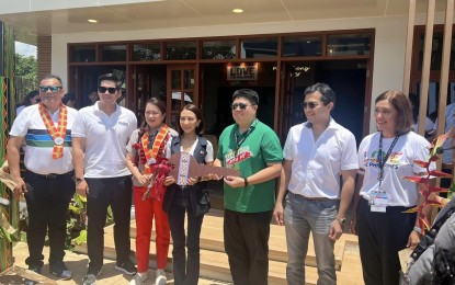 <p><strong>TOURIST REST AREA.</strong> Tourism Secretary Christina Frasco (center) leads the turnover and inauguration of the completed tourist rest area in Barangay Peñaplata, Island Garden City of Samal on Friday (Aug. 18, 2023). The facility intends to provide an enhanced tourism experience for tourists coming to the island through its ample amenities. <em>(PNA photo by Che Palicte)</em></p>