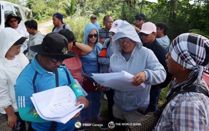 <p><strong>ROADS TO PROGRESS.</strong> Members of the Joint Technical Review and Subproject Appraisal and Review teams for two farm-to-market roads in the Caraga region are at work in Agusan del Sur in this undated photo. A total of 7,357 farming families in Dinagat Islands and Agusan del Sur will directly benefit from the PHP846.64 million, 31.75-km. road project, an official said Saturday (Aug. 19, 2023). <em>(Photo courtesy of DA-13 Information Office)</em></p>