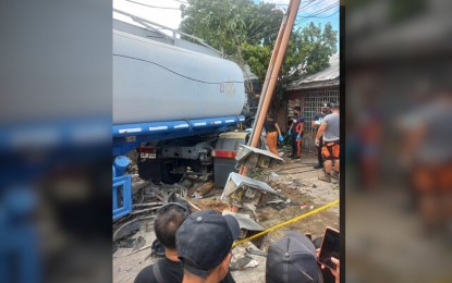 <p><strong>ROAD MISHAP.</strong> Four motorists were killed while another was injured when a wayward tanker truck hit them along the national highway in Bacong, Negros Oriental on Saturday (Aug. 19, 2023). Initial police investigation showed one of the tanker truck's tires burst, causing the driver to lose control of the vehicle. <em>(Photo courtesy of Negros Oriental Police Provincial Office)</em></p>