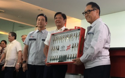 <p class="p1"><span class="s1"><strong>DONATED VEHICLES.</strong> President Ferdinand R. Marcos Jr. (center) receives from Toyota Motor Corp. chairperson Akio Toyoda (right) the keys to 35 vehicles donated by the car manufacturing firm during the ceremonial turnover at the Toyota Special Economic Zone in City of Santa Rosa, Laguna on Tuesday (Aug. 22, 2023). Marcos said he looks forward to strengthened partnership with Toyota as part of the transformation of the Philippine economy.<em> (PNA photo by Ruth Abbey Gita-Carlos)</em></span></p>