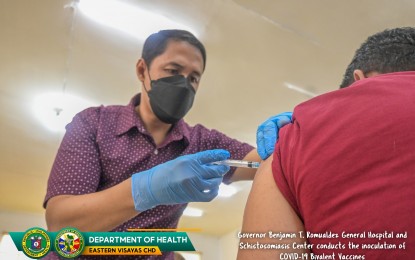 <p><strong>BOOSTER.</strong> A health worker in Palo, Leyte receives a bivalent Covid-19 vaccine in this July 24, 2023 photo. Health facilities in Eastern Visayas are asked to “re-strategize” ongoing bivalent vaccination against Covid-19 to fully consume the allocated vaccines on or before the end of August. <em>(Photo courtesy of DOH Region 8)</em></p>
