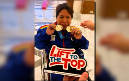 <p><strong>WINNER</strong>. Achelle “Jinky” Guion with her gold medals in the women's 45kg division at the World Para Powerlifting World Championships in Dubai, United Arab Emirates on Friday (Aug. 25, 2023). Guion got the medals for total and best lift in the Legends Category (45 years old and above) as the lone entry. <em>(Photo courtesy of Achelle Guion)</em></p>
