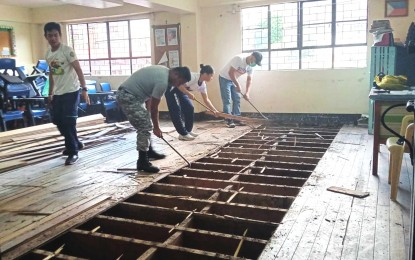 <p><strong>BRIGADA ESKWELA.</strong> Reservists from the 122nd Naval Combat Support Squadron Reserve join the “Brigada Eskwela” at Pines City National High School on Aug. 14, 2023. They are among the volunteers helping repair Super Typhoon Egay-damaged classrooms and school premises ahead of the opening of classes on Aug. 29, 2023. <em>(Photo courtesy of 122nd Naval Combat Support Squadron Reserve)</em></p>