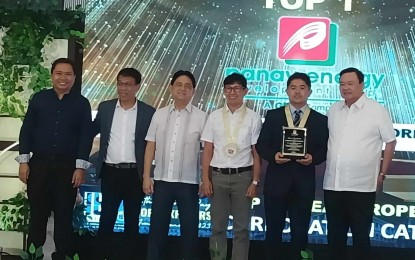 <p><strong>RECOGNIZED</strong>. The city government recognizes Panay Energy Development Corporation (PEDC) as the top taxpayer for business and real property tax under the corporation category in a ceremony held at the Grand Xing Hotel as part of the activities in line with the 86th Charter Day celebration of Iloilo City on Friday (Aug. 25, 2023). Philippine Foremost Milling Corporation chair Dr. Alfonso Uy, speaking on behalf of the awardees, emphasized the significance of business and investment to the growth of the city. <em>(PNA photo by PGLena)</em></p>
