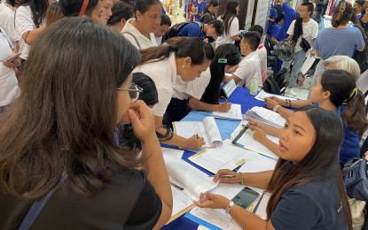 <p><strong>JOBSEEKERS</strong>. Hundreds of jobseekers register at the Technical Education and Skills Development Authority-organized "World Cafe of Opportunities" at Robinsons Ilocos on Friday (Aug. 25, 2023). The activity was in line with the "National Tech-Voc Day” celebration which aims to promote technical and vocational education and training across the country. <em>(PNA photo by Leilanie G. Adriano)</em></p>