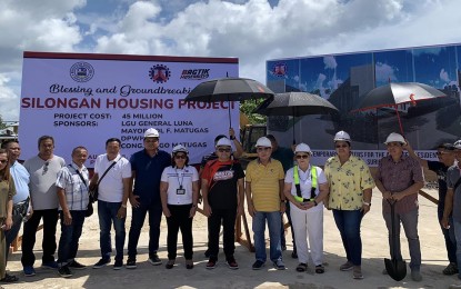 <p><strong>SYMBOL OF HOPE.</strong> Local officials grace the groundbreaking ceremony in Barangay Poblacion on Friday (Aug. 25, 2023) for a housing project that will soon rise in General Luna town in Siargao Island, Surigao del Norte. The 50-unit project will benefit residents who were severely affected by Super Typhoon Odette in December 2021. <em>(Photo courtesy of Mayor Sol Matugas)</em></p>