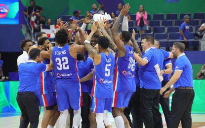 <p><strong>2-0.</strong> The Dominican Republic celebrates its second win in as many games at the FIBA Basketball World Cup at Smart Araneta Coliseum in Quezon City on Sunday (Aug. 27, 2023). The Dominicans upset the Italy five, 87-82, behind the 24 points each of Karl-Anthony Towns and Andres Feliz. <em>(PNA photo by Avito C. Dalan)</em></p>