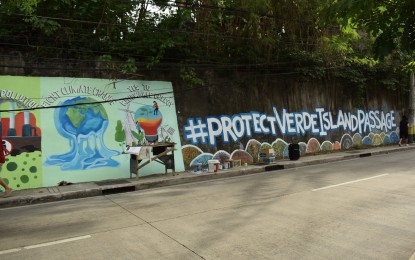 <p><strong>ENVIRONMENTAL TOURISM.</strong> Batangas' Provincial Tourism and Cultural Affairs Office (PTCAO) announces on Monday (Aug. 28, 2023) that the 34th Philippine Travel Mart will highlight Verde Island Passage (VIP) conservation efforts. Youth advocates and environmentalists painted a mural in Batangas City as part of their campaign to address ecological and climate problems faced by the VIP.<em> (Photo courtesy of Protect VIP)</em></p>