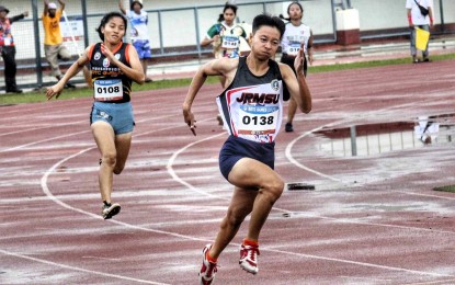 <p><strong>CHAMPION</strong>. Christine Gomobos (No. 138) in action during the 200 meters event in the Philippine Army category of the Reserve Officers' Training Corps (ROTC) Games Mindanao leg athletics competition held at the Joaquin F. Enriquez Memorial Sports Complex track and field stadium in Zamboanga City on Monday (Aug. 28, 2023). Gomobos won the race in 28.20 seconds. <em>(Photo courtesy of Philippine Sports Commission) </em></p>