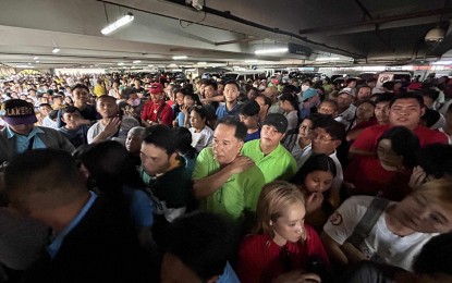 <p><strong>INTERESTED TO SERVE</strong>. Thousands wait at the entrance of the venue at Robinsons Place for the filing certificate of candidacy for the 2023 Barangay and Sangguniang Kabataan Elections in Iloilo City on Monday (Aug. 28, 2023). Commission on Elections Regional Director Dennis Ausan led the Regional Joint Security Control Center in activating checkpoints in selected areas in the province and city of Iloilo before visiting some precincts. <em>(PNA photo by PGLena)</em></p>