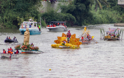 <p><strong>FLUVIAL PARADE.</strong> Boats decorated with various festive designs are the highlights during Monday's (Aug. 28, 2023) fluvial parade in celebration of the St. Augustine fiesta. The boats are the entries of the 13 barangays joining the festivity, which coincided with the month-long Higalaay Festival. <em>(Photo courtesy of CDO CIO)</em></p>