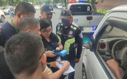 <p><strong>NEW DEPUTIZED AGENTS.</strong> Some of the 60 new deputized agents of the Land Transportation Office (LTO) test the handheld device in issuing an electronic Temporary Operator's Permit to the erring drivers. LTO-7 Regional Director Glen Galario on Tuesday (Aug. 29, 2023) said they have embarked on massive roadside vehicle inspections to ensure road safety among motorists and commuters. <em>(Photo courtesy of LTO-7)</em></p>