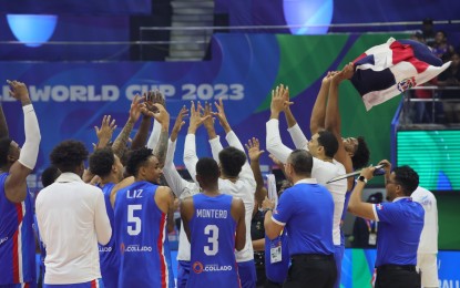 <p><strong>SWEEP</strong>. Dominican Republic celebrates after sweeping Group A of the FIBA World Cup via a 75-67 win against Angola at the Smart Araneta Coliseum in Quezon City on Tuesday (Aug. 29, 2023). Andres Feliz led the Dominican Republic with 17 points. <em>(PNA photo by Avito Dalan)</em></p>