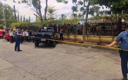 <p><strong>SLAIN ASPIRANT.</strong> Police cordon off the vehicle of Haron Dimalanis, an aspiring village chairperson in Midsayap, North Cotabato after he was shot and killed by two gunmen in front of the Midsayap town hall at 11:45 a.m. on Tuesday (Aug. 29, 2023). Midsayap Mayor Rolly Sacdalan condemned the attack and ordered stricter measures to prevent similar incidents in the future. (<em>Photo courtesy of Midsayap MPS)</em></p>