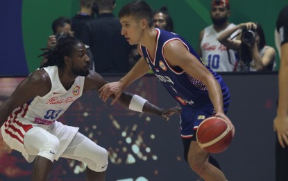 <p><strong>2-0.</strong> Serbia's Bogdan Bogdanovic dribbles the ball as he drives to the basket during the match against Puerto Rico in the FIBA Basketball World Cup at Smart Araneta Coliseum in Quezon City on Monday (Aug. 28, 2023). Serbia won, 94-77, and will go for a three-game sweep of Group B against South Sudan on Aug. 30<em>. </em><em>(PNA photo by Avito C. Dalan)</em></p>