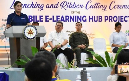 <p><strong>E-LEARNING HUB</strong>. Vice President Sara Duterte delivers her speech during the launching of the mobile e-learning hub project of the Visayas Command and 3rd Civil Relations Group (3CRG) at the DepEd Ecotech Center Pavilion in Sudlon, Lahug in Cebu City on Tuesday (Aug. 29, 2023). The facility, a modified trailer truck with 20-foot container van equipped with 20 laptop computers, printers, Smart TV and internet connections, will be deployed in areas in Cebu province where the soldiers are conducting community support program activities. <em>(Photo courtesy of Viscom PIO)</em></p>