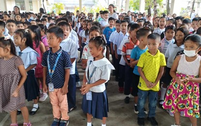 <p><strong>CLASSES RESUMED.</strong> Learners of the Col. Ruperto Abellon Sr. Memorial School in Barangay Poblacion, Patnongon, Antique, report to school for their first day of classes on Wednesday (Aug. 30, 2023). Antique Provincial Disaster Risk Reduction and Management officer Broderick Train said in an interview that classes remain suspended in 12 local government units of the province. (<em>PNA photo courtesy of Col. Ruperto Abellon Sr. Memorial School)</em></p>