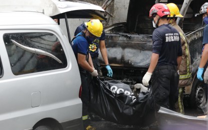 <p><strong>TRAGEDY</strong>. Efforts are underway to identify and bring home at least eight Occidental Mindoro residents killed in a printing establishment fire in Tandang Sora, Quezon City on Thursday (Aug. 31, 2023). Firefighters and other rescue personnel recovered at least 16 bodies from the scene of the blaze. <em>(PNA photo by Joey Razon)</em></p>