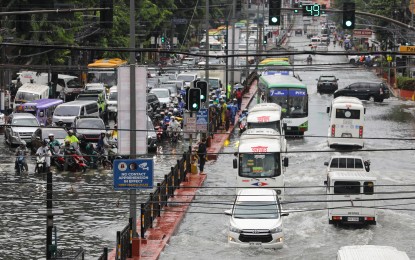 <p><strong>FLOODED.</strong> Motorists pass through gutter-deep floods along España Boulevard in Manila on August 31, 2023. Speaker Ferdinand Martin G. Romualdez and all concerned agencies involved in the fight against potential flooding in Metro Manila are set to convene on Tuesday (May 14, 2024) to come up with a unified strategy to address the immediate impacts of potential flooding and boost long-term resilience in communities at risk. <em>(PNA photo by Yancy Lim)</em></p>