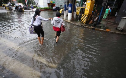 <p><strong>FLOODED.</strong> The corner of UN and Taft Avenues in Ermita, Manila is still flooded on Sunday morning (Sept. 3, 2023) as the southwest monsoon brings intermittent moderate to heavy rains. Typhoon Hanna and the enhanced southwest monsoon or "habagat" will bring rain showers and gusty winds over most parts of the country, the weather bureau said Monday (Sept. 4).<em> (PNA photo by Joan Bondoc)</em></p>