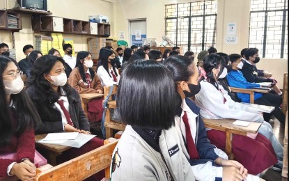 <p><strong>READINESS.</strong> Learners at the Baguio City National High School, the biggest secondary school in the city in terms of student population, listen to their teacher on the first week in this undated photo. The Baguio City Schools Division, in a report dated Sept. 18, 2023, said schools in the city are marked “ready” in terms of chairs and classrooms, based on a Department of Education rating form.<em> (Photo courtesy of Jeanne Campana)</em></p>