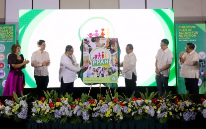 <p><strong>ADDRESSING MALNUTRITION.</strong> Health Secretary Teodoro Herbosa (3rd from left) and Science and Technology Secretary Renato Solidum Jr. (3rd from right) lead the launch of the Philippine Plan of Action for Nutrition for 2023–2028 at the Manila Hotel in Manila on Monday (Sept. 4, 2023). Through the PPAN, the government seeks to address all forms of malnutrition with a particular focus on stunting and wasting, obesity, micronutrient deficiencies and poor infant and young child feeding practices. <em>(PNA photo by Yancy Lim)</em></p>