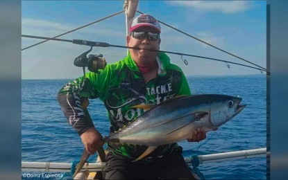 <p><strong>JIGGING.</strong> A participant of a fishing tournament in Borongan City, Eastern Samar in this Sept. 3, 2023 photo. The fishing tournament seeks to locate more fishing locations in the city’s Pacific Ocean. <em>(Photo courtesy of Borongan City information office)</em></p>