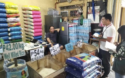 <p><strong>MONITORING</strong>. A team from the Department of Trade and Industry monitors the price and supply of rice and profiling of rice dealers in Central Luzon. This is in accordance with Executive Order No. 39 of President Ferdinand R. Marcos Jr. which mandates price ceilings on regular and well-milled rice in the markets. <em>(Photo courtesy of DTI-Zambales)</em></p>