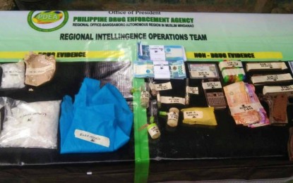 <p><strong>BUSTED.</strong> The illegal drugs and paraphernalia confiscated from a former police officer during an anti-drug operation in Barangay Bagua Mother, Cotabato City on Wednesday night (Sept. 6, 2023). The Philippine Drug Enforcement Agency-Bangsamoro Autonomous Region in Muslim Mindanao said the suspect, Nelson Sali, has been under a month-long surveillance for illegal drug activities.<em> (Photo courtesy of PDEA-BARMM)</em></p>