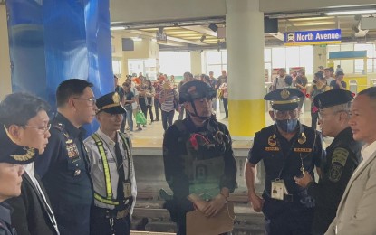 <p><strong>INSPECTION. </strong>Transportation and security officials meet during an inspection of the Metro Rail Transit Line 3 North Avenue station in Quezon City on Friday (Sept. 8, 2023). An inter-agency task force was tasked to investigate a bomb threat at the Edsa rail line. <em>(Photo courtesy of MRT-3)</em></p>
<p> </p>