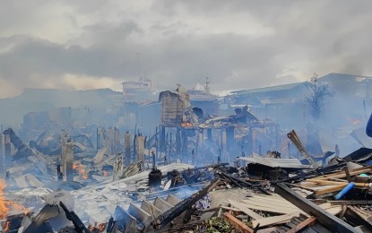 <p><strong>RAZED.</strong> Smoldering ruins are what are left of the around 100 houses razed by fire in Barangay Poblacion, Bongao town in Tawi-Tawi province on Thursday. Social Welfare and Development Secretary Rex Gatchalian on Friday (Sept. 8, 2023) ordered the agency’s Zamboanga Peninsula regional office to render immediate assistance to some 1,000 individuals affected by the huge fire. <em>(Photo courtesy of Tawi-Tawi Provincial Mobile Force Company)</em></p>