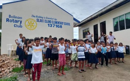 <p><strong>NEW SCHOOL YEAR</strong>. Learners attend the opening of classes at the Silaki Elementary School in Barangay Binabalian in Bolinao town, Pangasinan province on Aug. 30, 2023. The school which sits on top of the islet of Silaki has 38 enrolled learners this school year. <em>(Photo courtesy of Silaki Elementary School FB)</em></p>