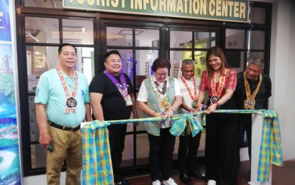 <p><strong>TOURISM CENTER</strong>. Antique Governor Rhodora Cadiao (3rd from left) cuts the ribbon during the opening of the Tourist Information Center (TIC) at the old capitol building in San Jose de Buenavista as part of the celebration of Tourism Month on Friday (Sept. 8, 2023). Cadiao, in her message, said Antique has a diverse topography, which is attractive to tourists. (<em>PNA photo by Annabel Consuelo J. Petinglay</em>)</p>