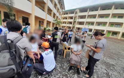 <p><strong>EMERGENCY RESPONSE.</strong> Personnel from the Barangay Mintal Disaster Risk Reduction Management Council provide first aid to students who fainted after a 4.7 magnitude earthquake jolted Davao City at 3:51 pm on Wednesday (Sept. 6, 2023). On the same day, Intensity 4 (moderately strong) was also felt in Kidapawan City, and Intensity 3 in the towns of Antipas, President Roxas, and Matalam, all in North Cotabato province. <em>(Photo from Mintal BDRRMC Facebook)</em></p>
