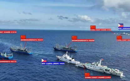 <p><strong>HARASSMENT.</strong> Philippine Coast Guard handout photo shows BRP Cabra (center) surrounded by Chinese Coast Guard and Chinese maritime militia vessels while on its way to a resupply mission at Ayungin Shoal on Friday (Sept. 8, 2023). PCG spokesperson for the West Philippine Sea Commodore Jay Tarriela said the latest military resupply mission was successfully completed despite challenging circumstances brought about by the illegal presence and activities of the Chinese in the Philippines' exclusive economic zone. <em>(PCG)</em></p>