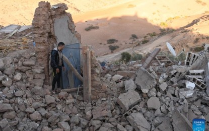 <p><strong>SYMPATHY.</strong> A man walks among the rubble of a damaged building in Tahannaout, Morocco on Saturday (Sept. 9, 2023) after the previous night’s 6.8-magnitude earthquake. Philippine House of Representatives leader Ferdinand Martin Romualdez on Sunday (Sept. 10, 2023) extended his condolences to the families of the quake victims.<em> (Photo by Saouri Aissa/Xinhua)</em></p>