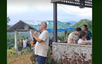 <p><strong>RESTRAINING ORDER.</strong>  Palompon, Leyte Mayor Ramon Oñate speaking to supporters in San Joaquin village on September 8.  He issued a statement after the issuance of a temporary restraining order prohibiting authorities from excavating waste allegedly buried in the mayor's property. <em>(Photo courtesy of Ramon Oñate)</em></p>