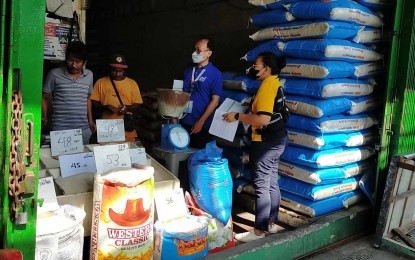 <p><strong>PROFILING</strong>. Personnel of the Department of Trade and Industry in Iloilo conduct a monitoring and profiling of rice retailers on Sept. 5, 2023. The Department of Social Welfare and Development (DSWD) is waiting for the list of small-time retailers eligible to receive the subsidy under the Sustainable Livelihood Program - Economic Relief Subsidy. <em>(PNA photo courtesy of DTI Iloilo)</em></p>