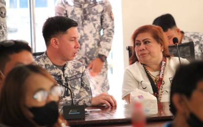 <p><strong>JOINT EFFORT.</strong> Capt. Victorino Acosta IV, Station Commander of the Philippine Coast Guard - Batangas (left), and Amor Banelos-Calayan, Provincial Disaster Risk Reduction Management Office (PDRRMO) head, are seen as they jointly drafted a Provincial Oil Spill Contingency Plan on Aug. 15, 2023. Parallel surveys conducted by the provincial government of Batangas and the PCG strongly indicate that Verde Island Passage and nearby waters are now free of petroleum contaminants from an oil spill off Oriental Mindoro’s coast earlier this year, Calayan said Wednesday (Sept. 13, 2023). <em>(Photo courtesy of PCG-Southern Tagalog)</em></p>
