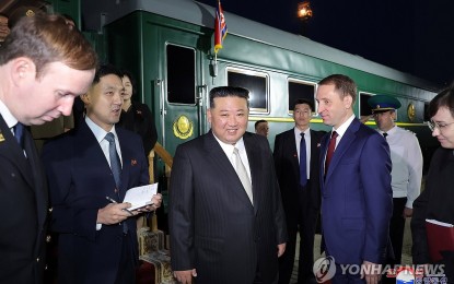 <p><strong>MEETING WITH PUTIN.</strong> North Korean leader Kim Jong-un talks with Russian officials after arriving in the Russian border city of Khasan aboard his special train on Sept. 12, 2023, en route to an unspecified location for a summit with Russian President Vladimir Putin, in this photo provided by the North's official Korean Central News Agency. Kim said his trip to Russia for a meeting with Putin is a "clear manifestation" of North Korea prioritizing the strategic importance of their bilateral ties, the KCNA reported.<em> (Korean Central News Agency handout/Yonhap)</em></p>