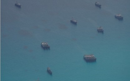 <p><strong>TERRITORIAL INTEGRITY.</strong> Chinese vessels trespass on Iroquois Reef, a body of water within the West Philippine Sea (WPS), as seen in this aerial photo taken on Sept. 7, 2023. House of Representatives Speaker Ferdinand Martin G. Romualdez said Thursday (Dec. 7) they are committed to protecting the territorial integrity of the Philippines in the WPS. <em>(Photo from AFP Wescom)</em></p>