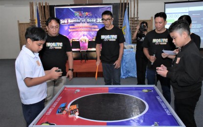 <p><strong>ROBOTICS CHALLENGE</strong>. Students in Negros Occidental compete in the sumo bots category of the “Battle of Bots: Provincial Level Robotics Competition” in Bacolod City on Sept. 7, 2023. Ma. Cristina Orbecido, vocational school administrator of Negros Occidental Language and Information Technology Center, said on Friday (Sept. 15, 2023) they will continue to engage students in robotics and intelligent machines program to produce young Negrense inventors. <em>(Photo courtesy of Negros Occidental Language and Information Technology Center) </em></p>