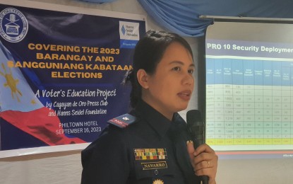 <p><strong>BSKE SECURITY</strong>. Police Major Joanne Navarro, spokesperson of the Police Regional Office Region 10 (PRO-10) updates the press on the number of barangays in Northern Mindanao under "Areas of Concern" on Saturday (Sept. 16, 2023). Navarro's data from the PRO-10 showed that while there were no barangays under code "red," there are 155 under code "orange," and 42 in code "yellow." <em>(PNA photo by Nef Luczon)</em></p>