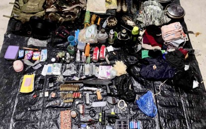 <p><strong>OVERRUN.</strong> The firearms and other items recovered by troops of the Philippine Army’s 15th Infantry Battalion from a hideout of the Communist Party of the Philippines-New People’s Army South West Front in the hinterlands of Sipalay City, Negros Occidental Saturday afternoon (Sept. 16, 2023). The place was discovered after an encounter between the soldiers and communist rebels in Sitio Tunap, Barangay San Jose. <em>(Photo courtesy of  Philippine Army 15IB)</em></p>
<p> </p>