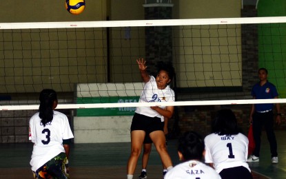<p><strong>ATTACK</strong>. Granby College of Science and Technology (GCST) spiker Amabelle Borromeo scores on a spike during the match against Don Honorio Ventura State University (DHVSU) in the Philippine Army category of the Reserve Officers' Training Corps (ROTC) Games Luzon leg women's volleyball competition held at the Cavite State University (CAVSU) Don Severino delas Alas campus gymnasium in Indang, Cavite on Tuesday (Sept. 19, 2023). GCST prevailed, 25-14, 25-20, 25-18. <em>(Photo courtesy of Philippine Sports Commission) </em></p>