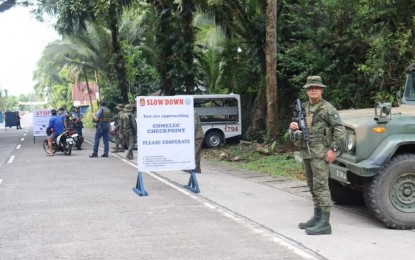 <p><strong>REASSESSING SECURITY.</strong> Security forces man a Comelec checkpoint in Negros Oriental. The Regional Joint Security Control Center-Central Visayas will reassess the security situation in Negros Oriental to determine if there is a need to deploy more troops, as the Comelec En Banc ruled to push through with the Barangay and SK Elections in the violence-hit province on Oct. 30, 2023. <em>(Photo courtesy of Viscom PIO)</em></p>